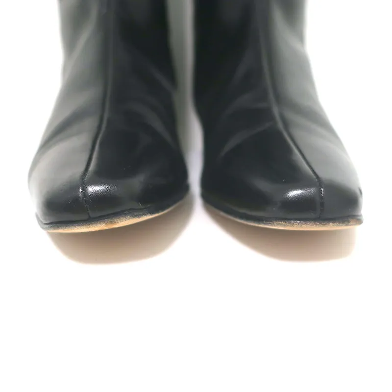 Bottes plates mi-haute Manolo Blahnik en cuir noir taille 37