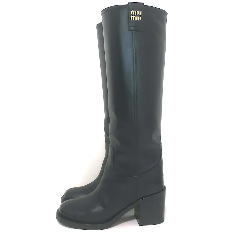 Bottes mi-hautes à enfiler détaillées avec logo Miu Miu en cuir noir taille 37