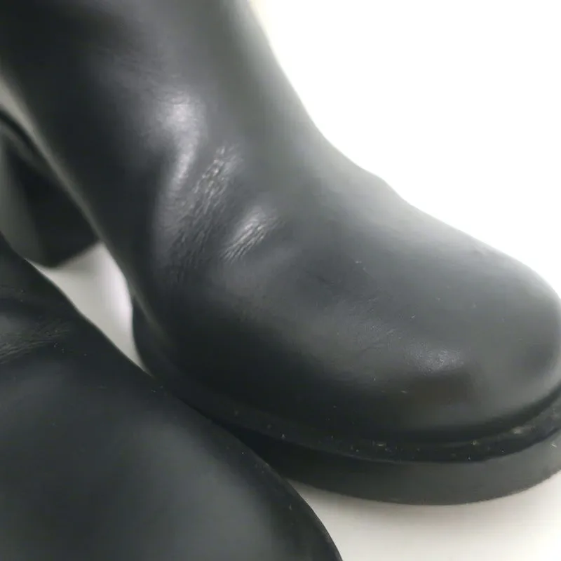 Bottes mi-hautes à enfiler détaillées avec logo Miu Miu en cuir noir taille 37
