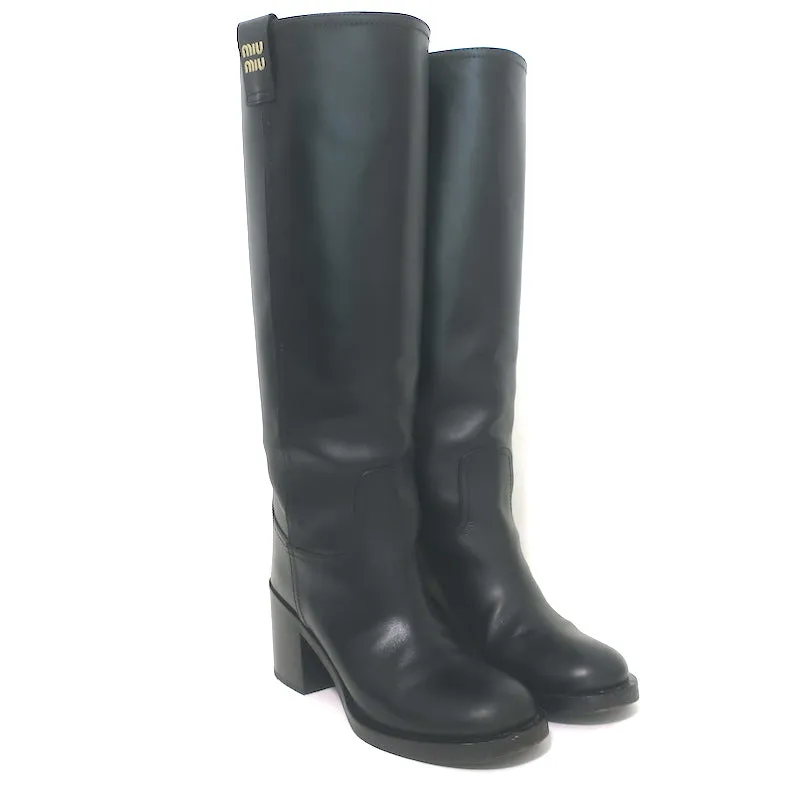 Bottes mi-hautes à enfiler détaillées avec logo Miu Miu en cuir noir taille 37