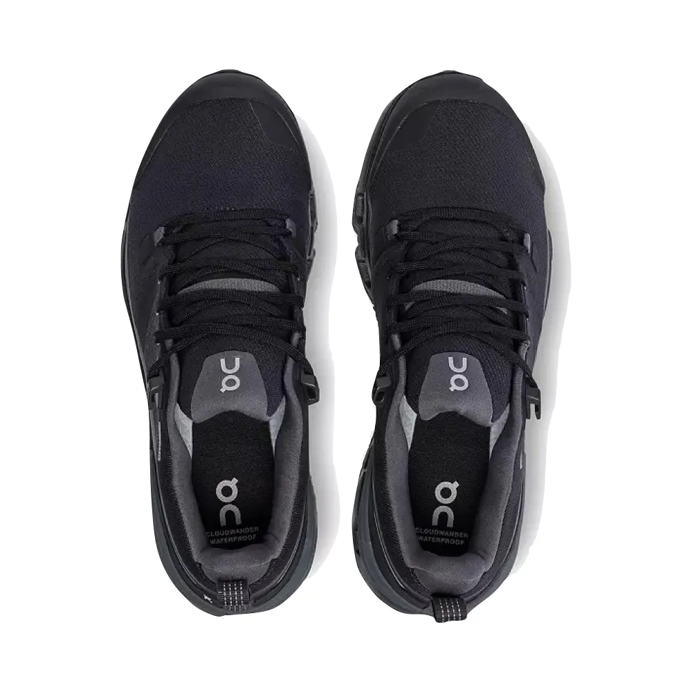 Sur les chaussures de randonnée basses imperméables Cloudwander pour femmes en noir/éclipse