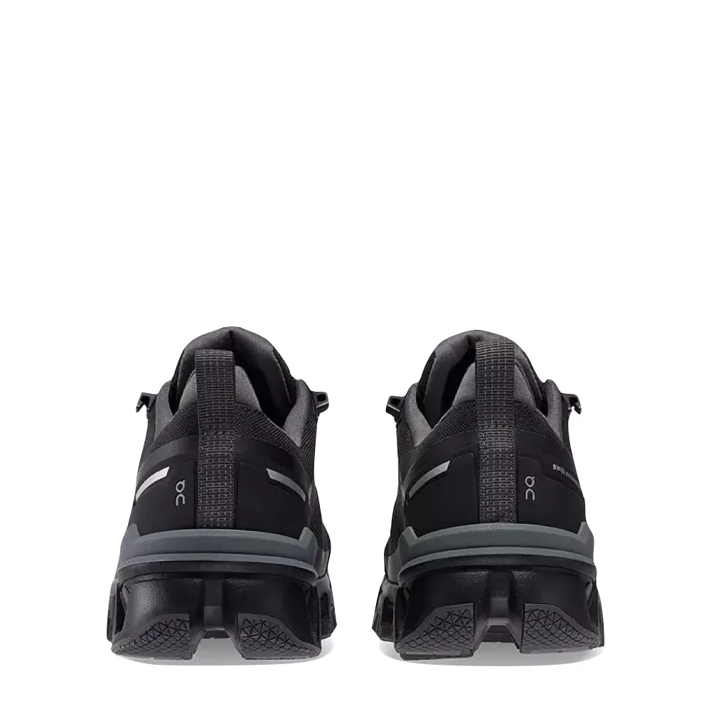 Sur les chaussures de randonnée basses imperméables Cloudwander pour femmes en noir/éclipse