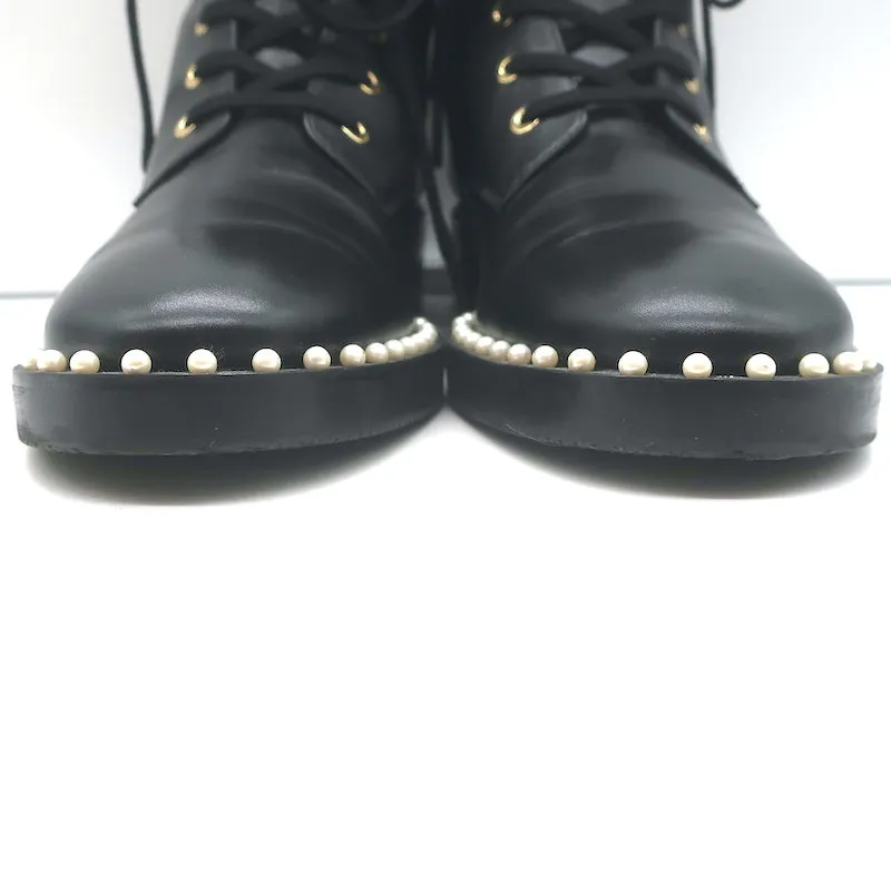 Stuart Weitzman Bottes de combat plates à ornements perlés Sondra en cuir noir Taille 9