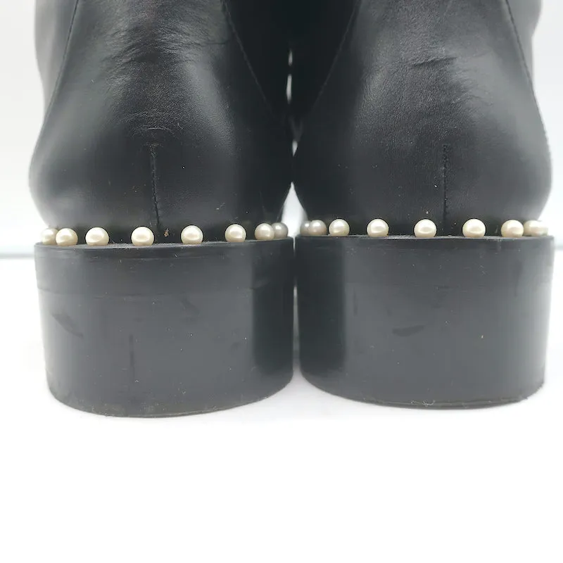 Stuart Weitzman Bottes de combat plates à ornements perlés Sondra en cuir noir Taille 9
