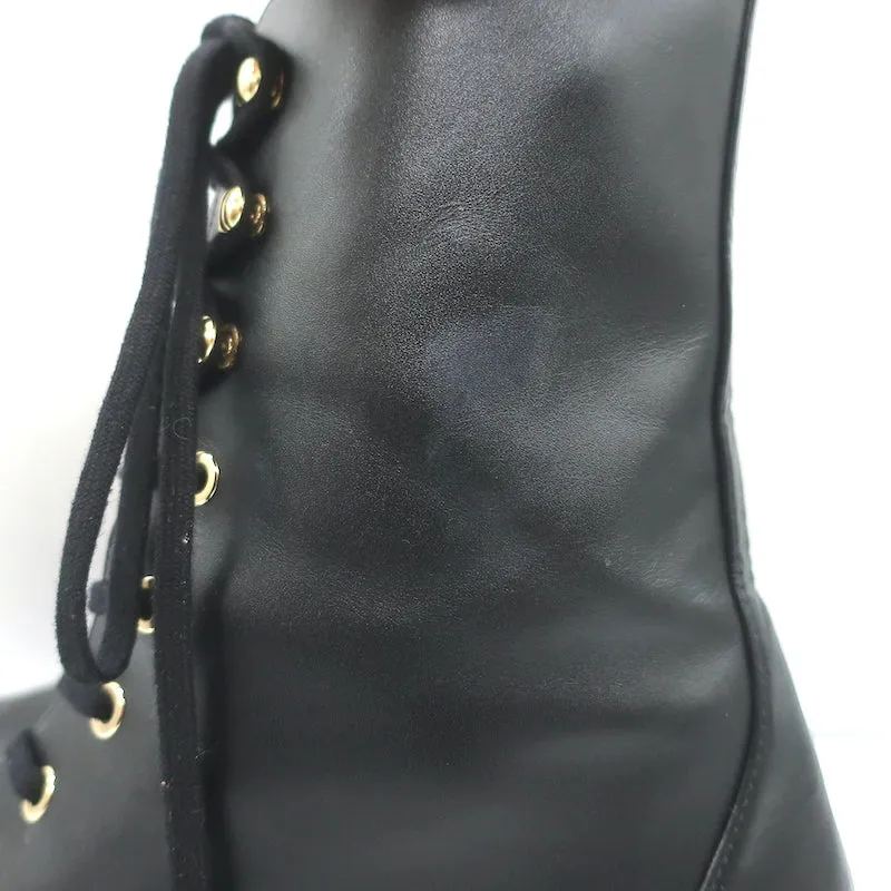 Stuart Weitzman Bottes de combat plates à ornements perlés Sondra en cuir noir Taille 9