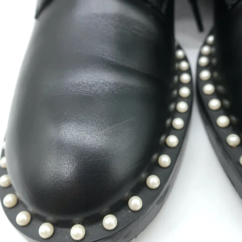 Stuart Weitzman Bottes de combat plates à ornements perlés Sondra en cuir noir Taille 9